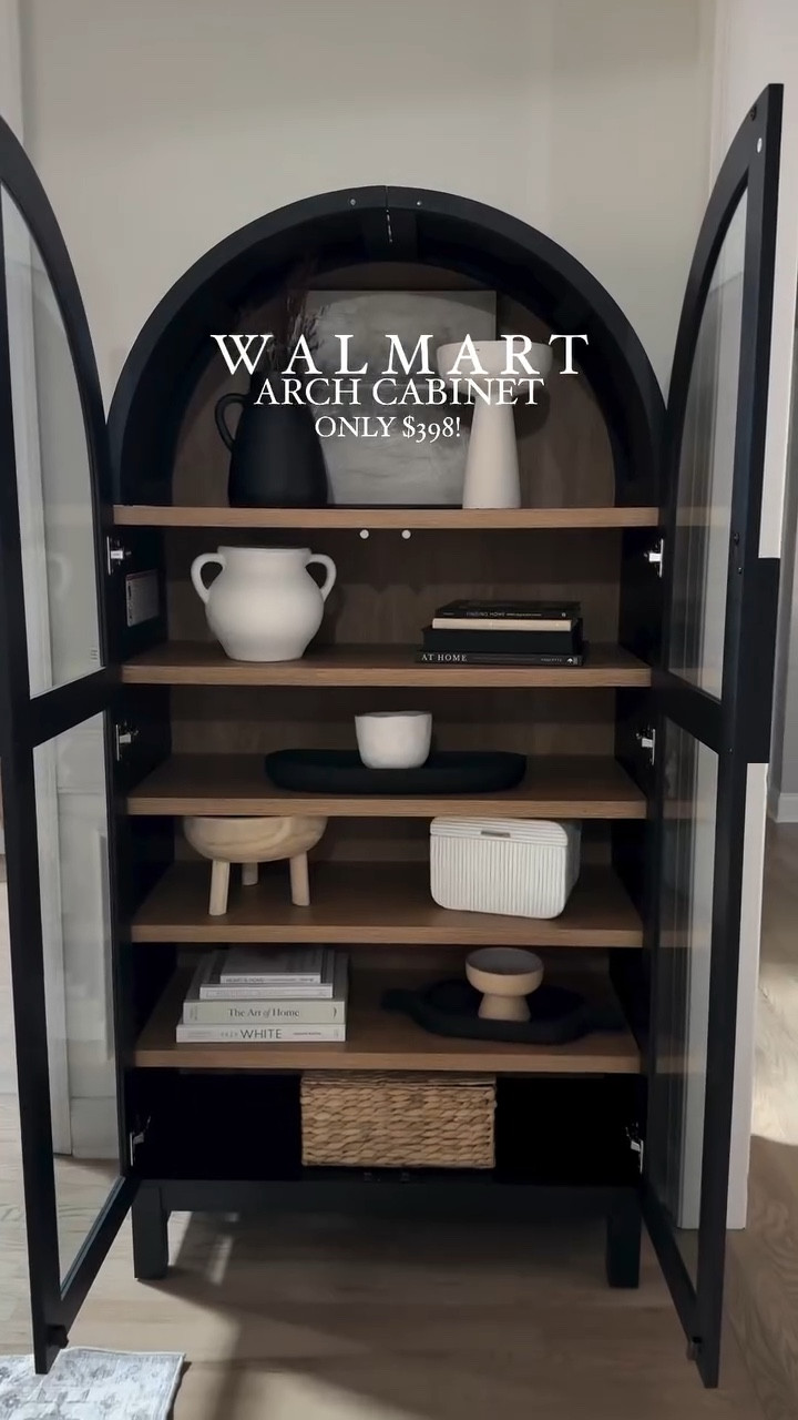 Can you believe this arched cabinet is only $398?! 🤩

And it’s back in stock! 

It comes in an oak color as well, and the scale is so good! 36 in W x 16.375 in D x 72.25 in H - so very similar to other designer options that are 5-10x this price!

It’s does not come assembled, so prepare to take time to assemble, but it’s so worth it as it’s a nice and sturdy and looks so high end!

This spot in my dining room was the perfect spot for it, and I’m loving how it compliments my other black accents in my space. 
 
I updated the hardware to these Amazon gold ones to elevate the look!

#homestyle #homestyling #interiordesign #walmarthome #walmartfinds #archedcabinet #cabinet #cabinetstyling #affordablehomedecor #homedecor #homestyling  #neutralhome #myneutralhome #homedecorating #homedecorfinds #livingroomdecor #livingroom #bedroomdecor #diningroomdecor #organicmodern #modernorganic #ltkhome

#LTKHome #LTKVideo #LTKSaleAlert