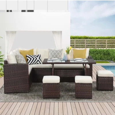 7 Piece Wicker Patio Dining Set With 9-Seat Sectional, Ottomans, And Dining Table For Outdoor Entertaining | Wayfair North America
