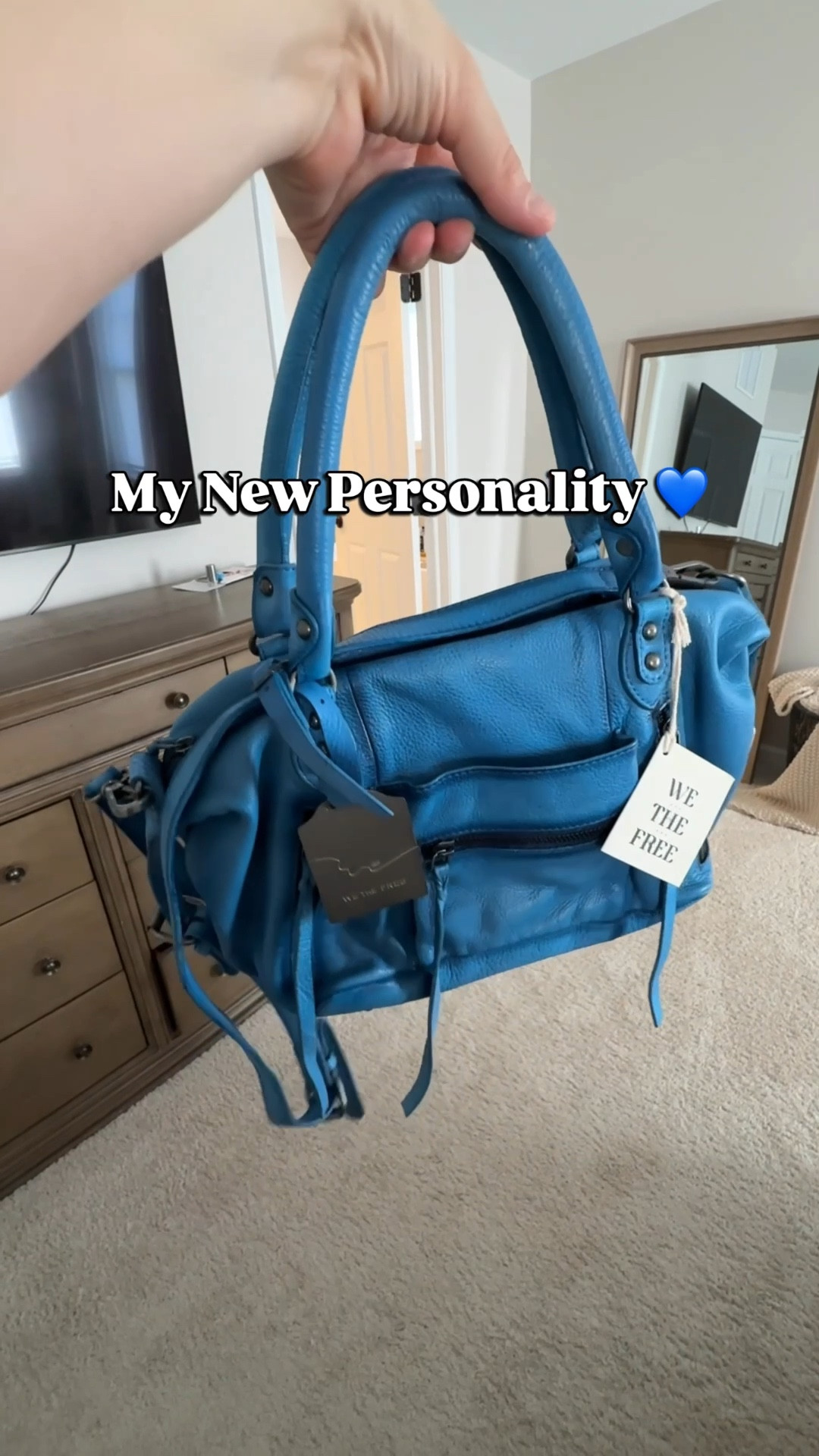This blue @freepeople Baby Emerson tote is officially my new personality 💙 and if you need me, I’ll be over here making cute little bag charms to swap out depending on my mood 😌✨
