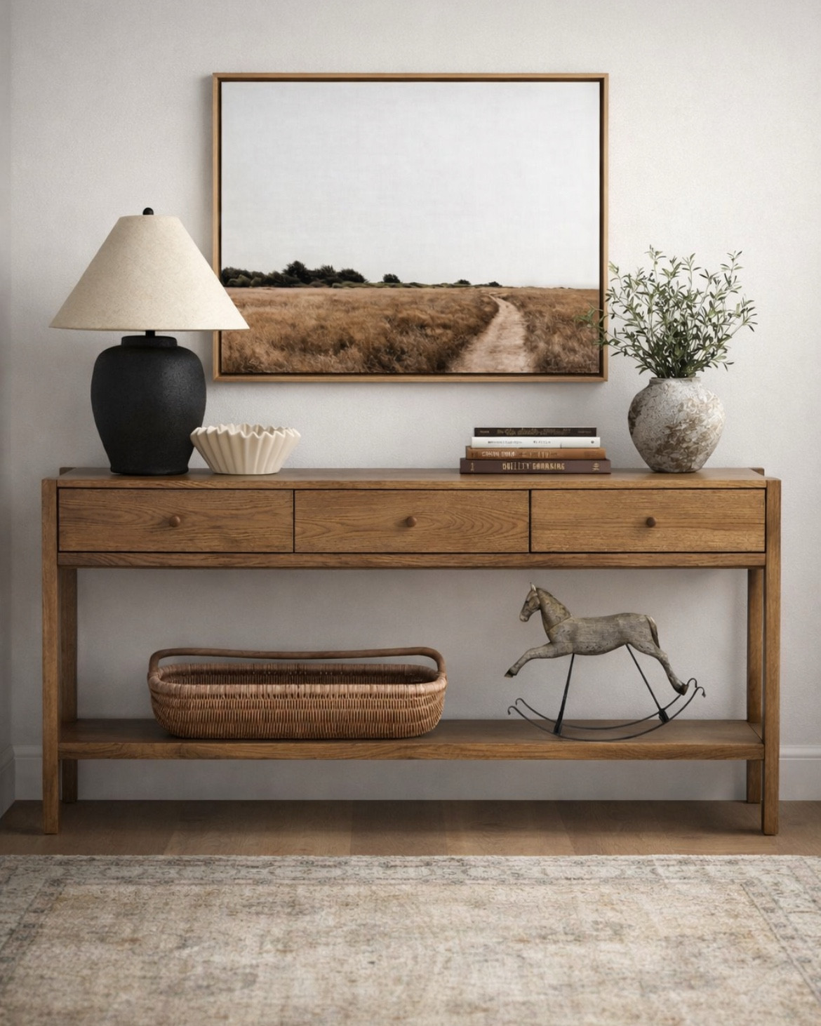 Timeless traditional entryway 🙌🏻

Loving this wood console table with drawers and a bottom shelf. 

#horse #equestrian #home #decor #lamp #runnerrug #neutraldecor #entryway #basket #artprint #landscape

#LTKmomlife #LTKSaleAlert #LTKHome

#LTKHome #LTKmomlife #LTKSaleAlert
