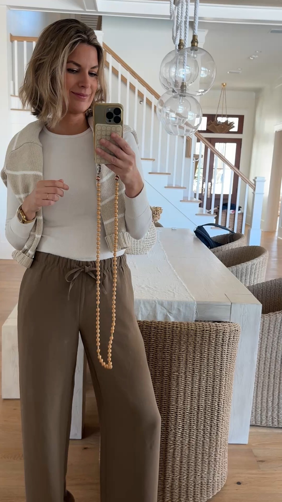 I am 5’11” wearing small tall in these wide leg pants. Linking a save option too.  Small tee and sweater. Sneakers true to size.  

#LTKOver40 #LTKTall #LTKootd