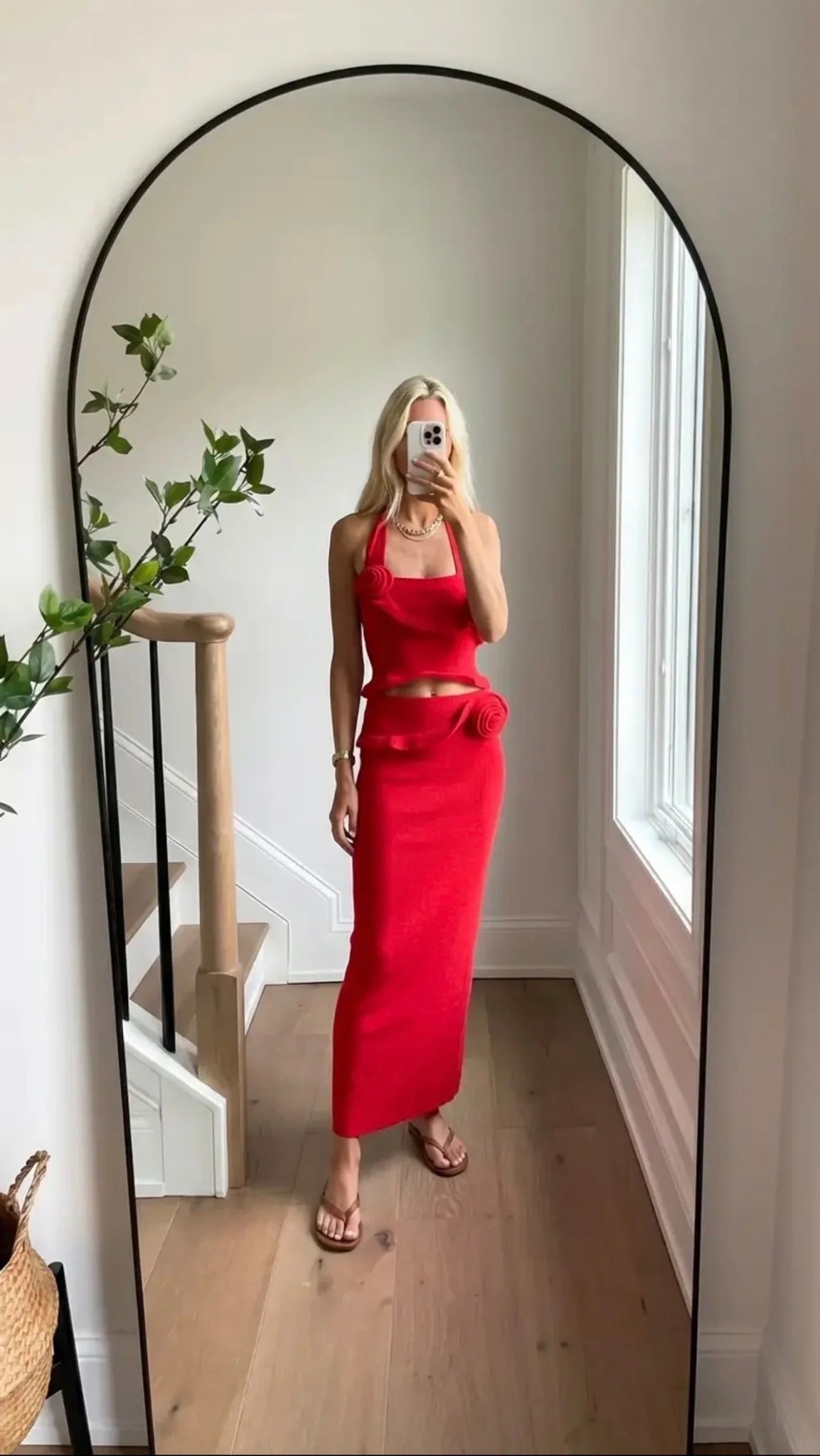 minimalist mirror selfie / modern neutral home / arched mirror aesthetic / natural light streaming / effortless luxury style / red monochrome outfit / fitted crop top + midi skirt / rosette details / clean girl aesthetic / gold jewelry accents / casual chic with flip flops / blonde hair loose waves / elevated everyday elegance / pinterest worthy composition / soft shadows / calm refined vibe

Hashtags:
#SoraStyle #MinimalistAesthetic #CleanGirlLook #RedOutfit #ChicStyle #EffortlessFashion #NeutralHome #MirrorSelfieStyle #ModernElegance #PinterestOutfit #SummerStyle #CapsuleWardrobe #QuietLuxury #StyleInspo #OOTDInspo

Words ( / separated ):
elevated / feminine / sleek / minimal / refined / modern / effortless / polished / chic / monochrome / bold / flattering / soft / luxe / clean / timeless / aesthetic / natural / airy / sophisticated

#LTKdayinmylife #LTKgrwm #LTKFestival