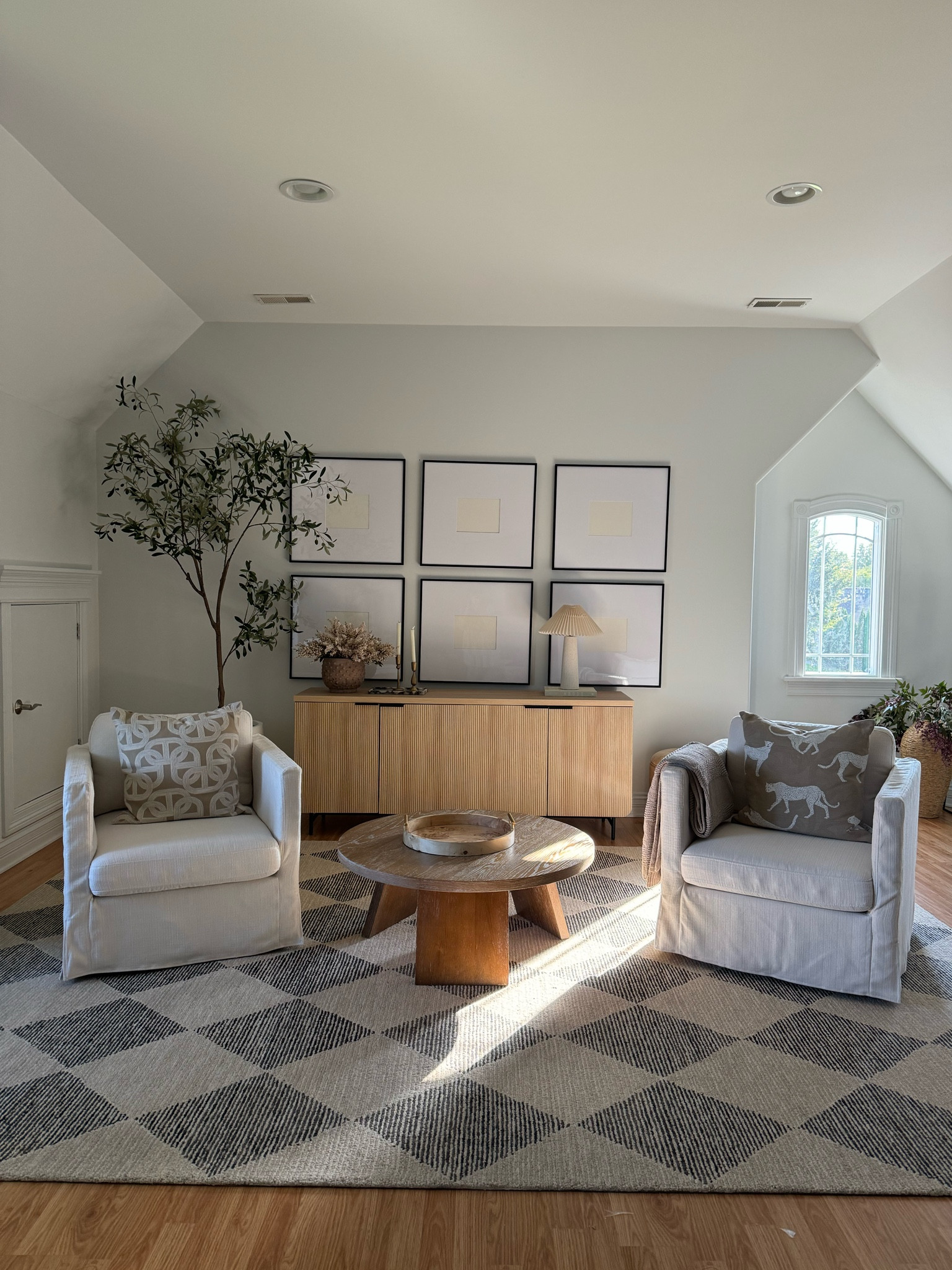 Obsessed with this rug! The statement pattern is everything! And my swivel chairs are only $178 now on sale!!! 

Bonus room, area rug, living room, accent chair, swivel chair, sideboard, coffee table, gallery frame, chair, 

#LTKSaleAlert #LTKHoliday #LTKHome