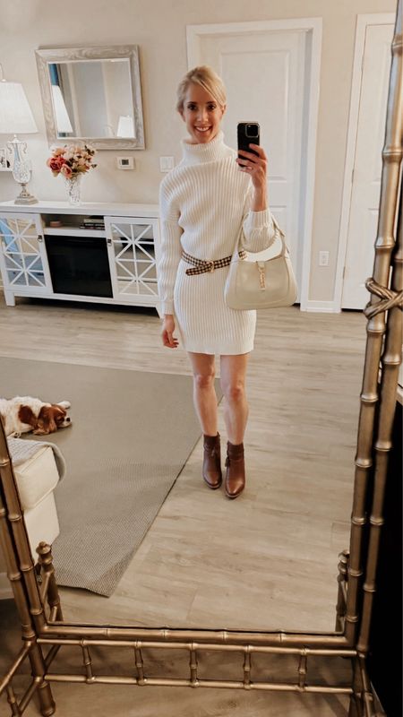 For my Winter 2024 casual chic look, I've opted for an elegant ivory sweater dress adorned with a vintage belt that beautifully accentuates the waist. 

I've paired this ensemble with stylish short brown boots sporting petite heels – a perfect choice for a comfortable stroll to dinner while adding a touch of sophistication and elongating my legs.

Sadly, the Gucci handbag is not mine— my mom lent it to me for the month. Lol. It’s so stunning! “The Jackie 1961” is available in white leather exclusively in Gucci stores and on Gucci.com. If you buy it, I’ll be green with envy! Ha ha ;) what a great day/night bag  

#LTKover40 #LTKSeasonal #LTKstyletip