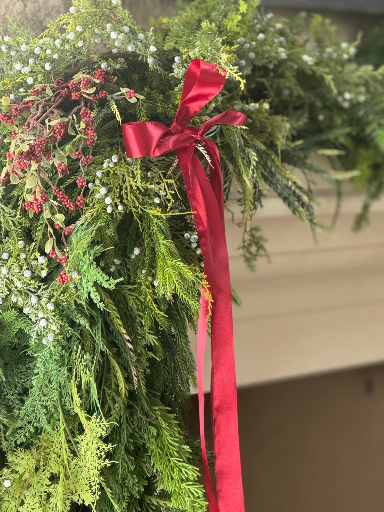 Spruce up your garland with juniper berries and red stems.

#LTKSeasonal #LTKHome #LTKHoliday