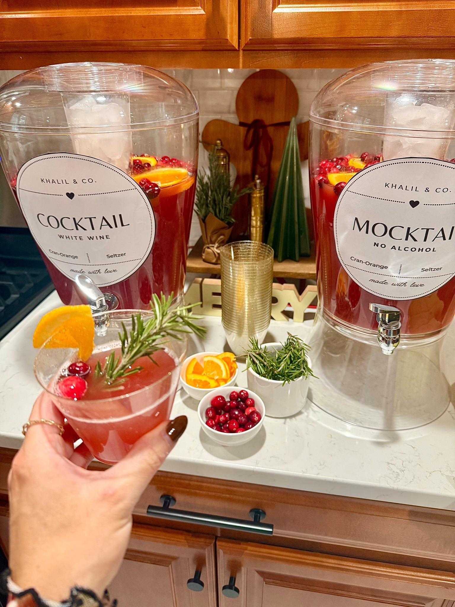 Bought these drink dispensers a few years ago, and put them to good use for our Thanksgiving event 🍹 I customized and printed these signs for free at Canva. Cuuuttteeee little setup for a cocktail / mocktail bar 🥰 #cocktails #mocktails #cocktailbar

#LTKCyberWeek #LTKHome #LTKHoliday