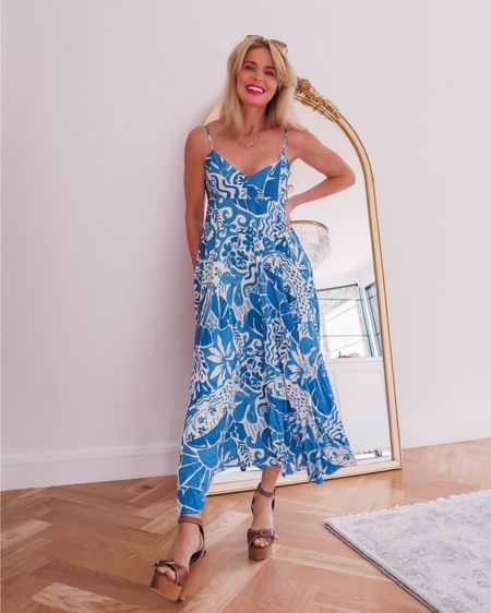 How gorgeous is this blue dress by Aqua?! I love the print, flowy fabric, and overall fit. It has a flattering v-neckline and a fit-and-flare silhouette. The fabric is lightweight and the length is perfect (I’m 5’4”). I styled it with a pair of heels but I’ll definitely wear it with sandals and sneakers this summer too!

~Erin xo 

#LTKWedding #LTKTravel #LTKSeasonal