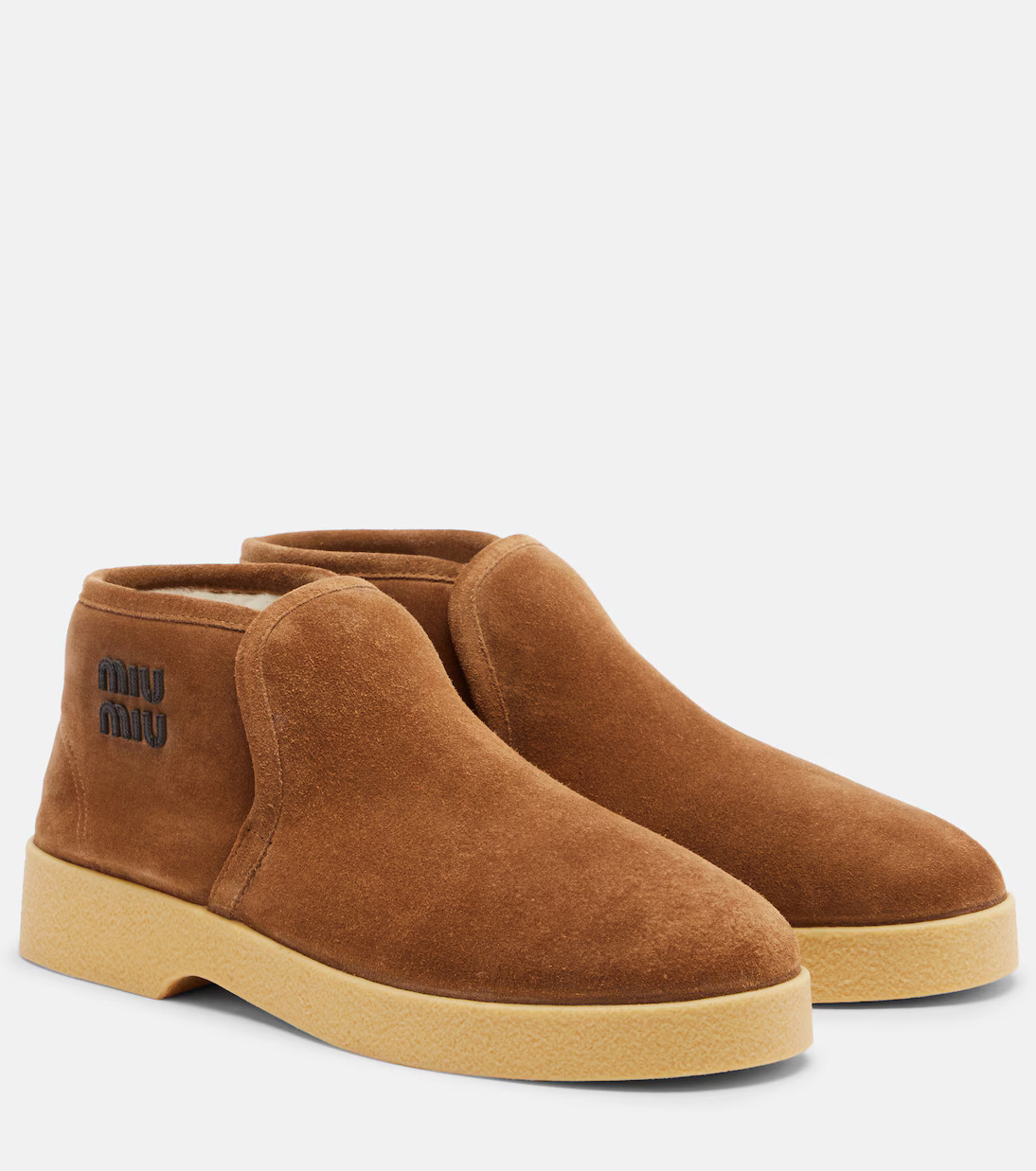 Shearling-lined suede boots | Mytheresa (US/CA)