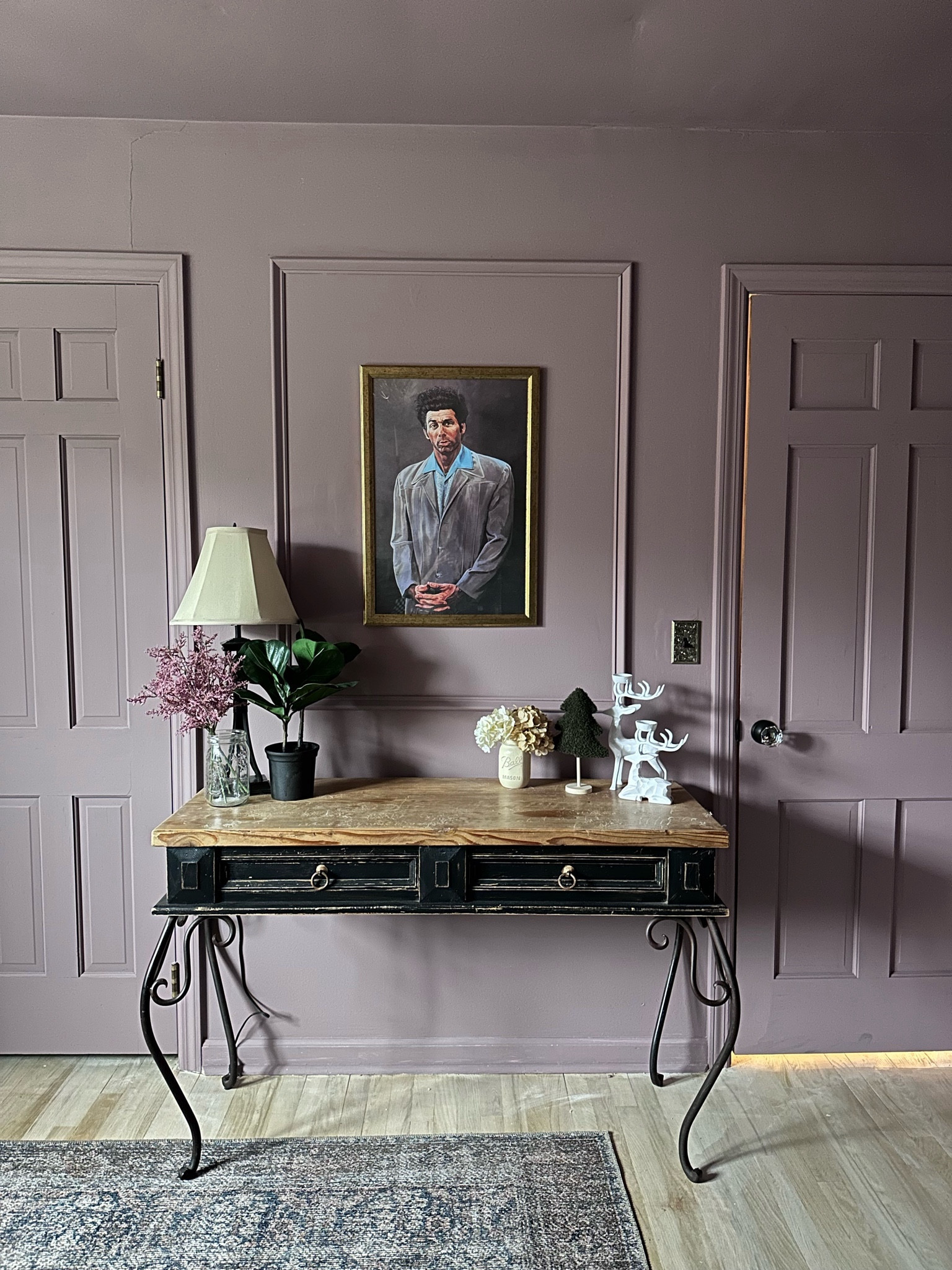 A moody guest bedroom based around a painting and a color  