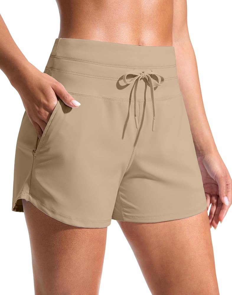 Soothfeel Women's Athletic Running Shorts with Pockets 3.5"/ 5" Quick Dry High Waisted Workout Ac... | Amazon (US)