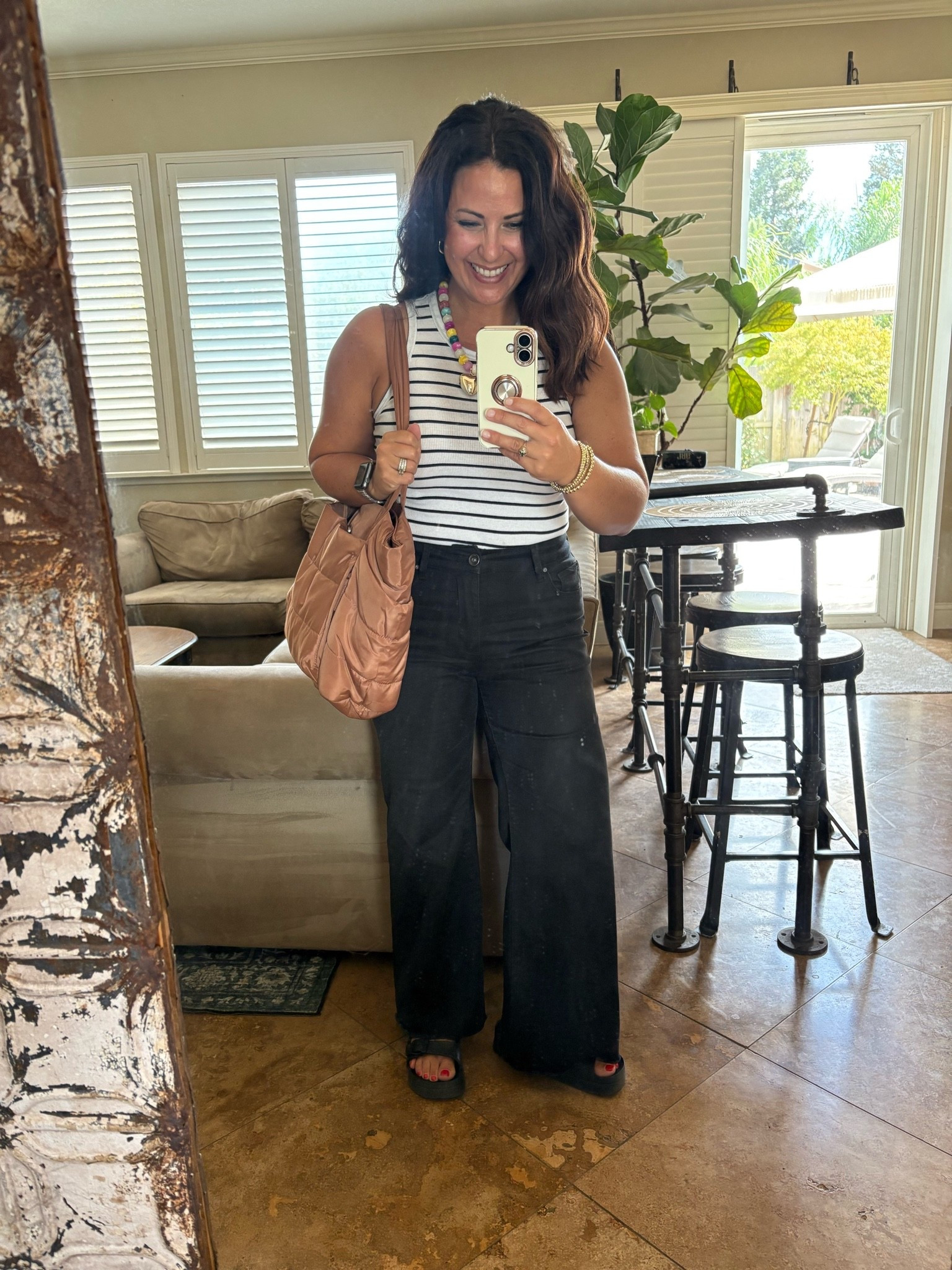 Friday teacher outfit 🤎 Keeping it simple, comfortable, and polished with this easy teacher workwear outfit: a striped tank, high-waisted black wide-leg pants, and a quilted tote that adds the prettiest neutral touch.

These black wide-leg pants are such a versatile workwear staple and the full-length fit is especially great for petites! Perfect for teacher outfit ideas, casual work outfits, fall transitional outfits, and Amazon fashion. Linking everything I can below! ✨

#teacheroutfit #teacherstyle #teacherworkwear #workwearoutfit #falloutfit

#LTKootd #LTKPetite #LTKWorkwear
