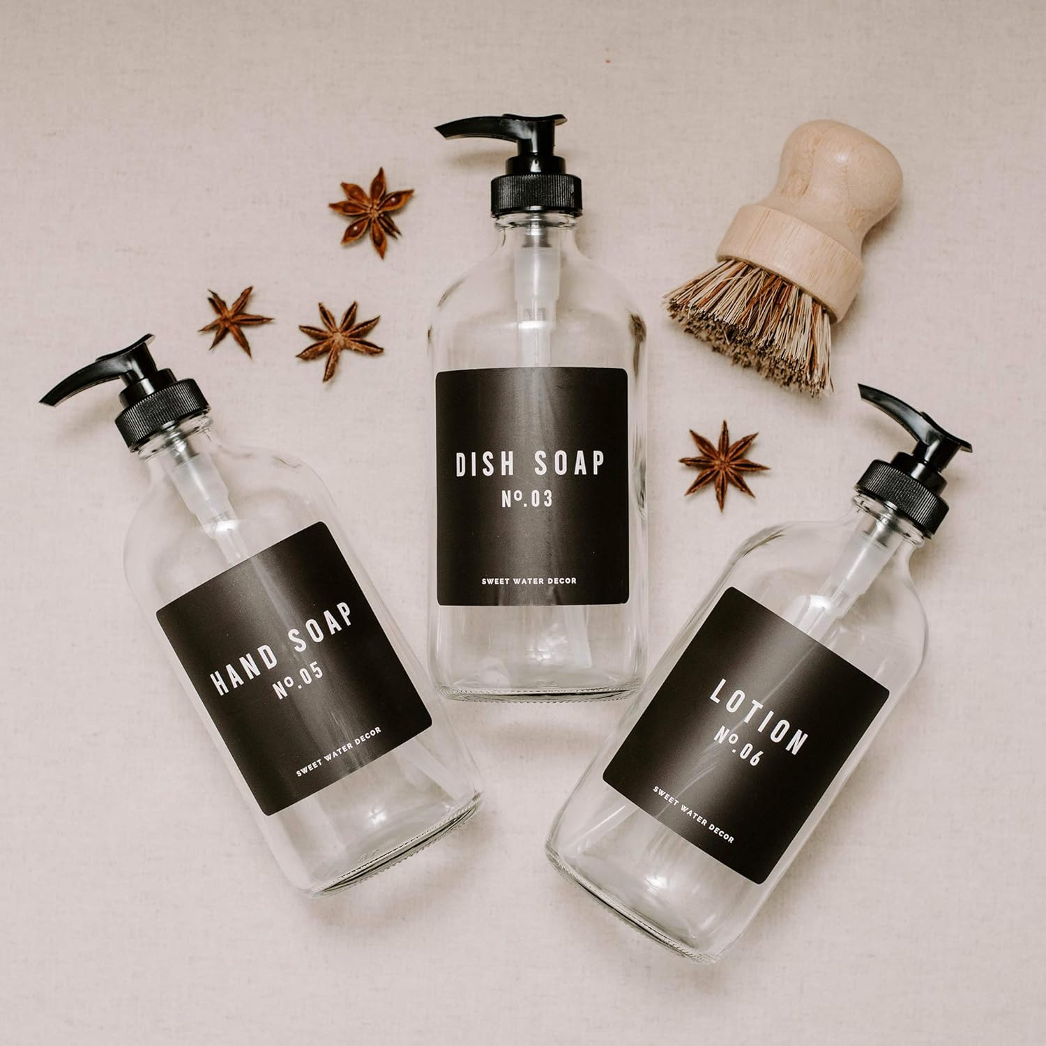 Sweet Water Decor Clear Glass Refillable Bottle | Modern Farmhouse Soap Dispenser with Waterproof... | Amazon (US)