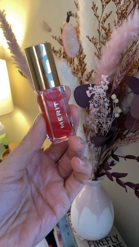 Merit tinted lip oil shade Maraschino 

#LTKVideo #LTKfindsunder50 #LTKbeauty