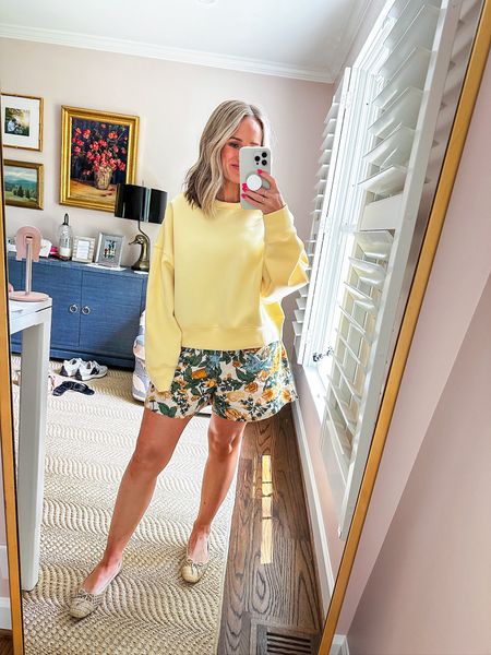 Butter yellow sweatshirt from Abercrombie (material is smooth like SPANX Air Essentials). Wearing a size medium in the sweatshirt and a size small in the floral linen shorts. My shoes are raffia ballet flats and they are on sale! They run TTS and I LOVE them. 

#LTKShoeCrush #LTKStyleTip #LTKSeasonal