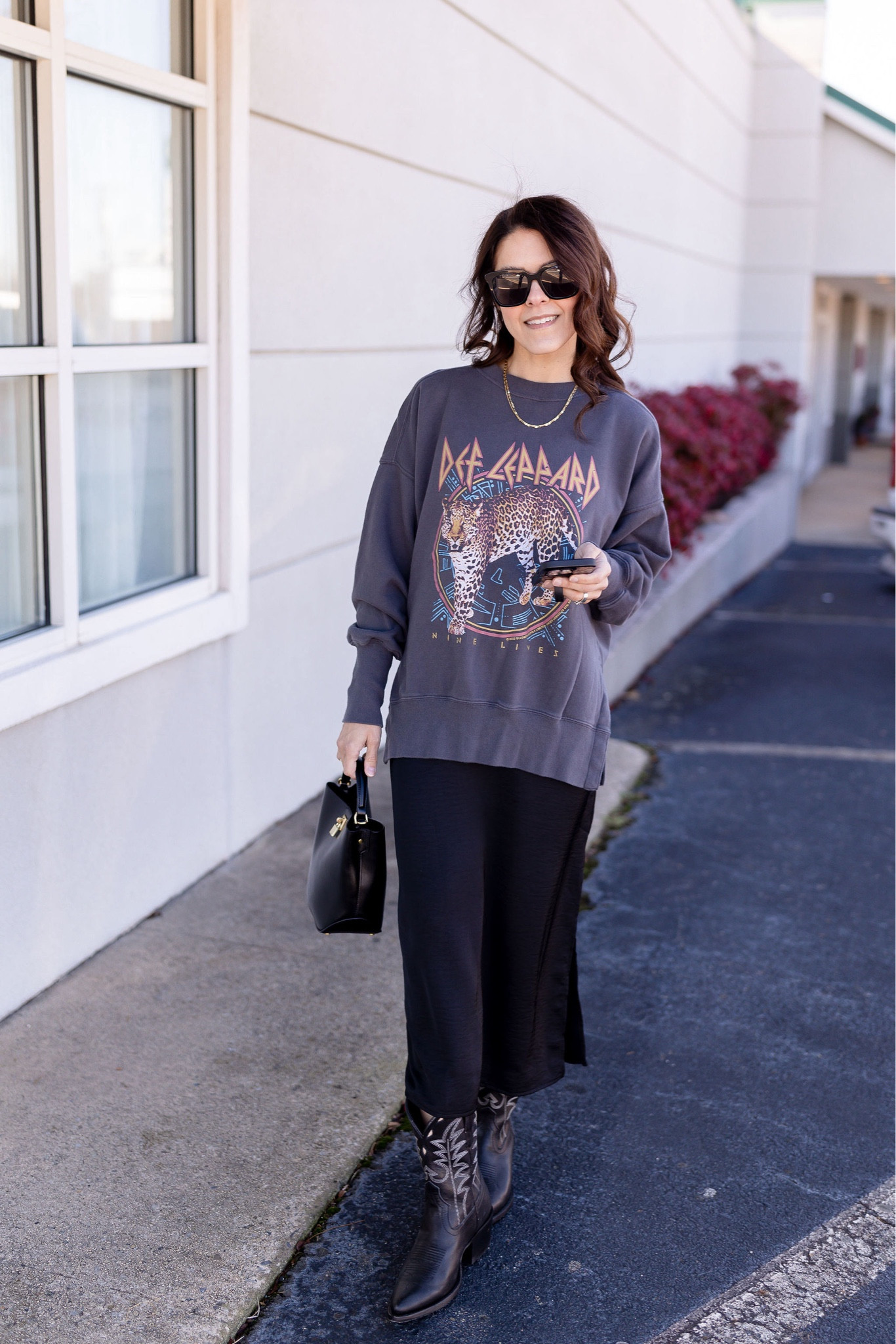 Pinterest inspired outfit | graphic sweatshirt, slip dress, western boot, handbag