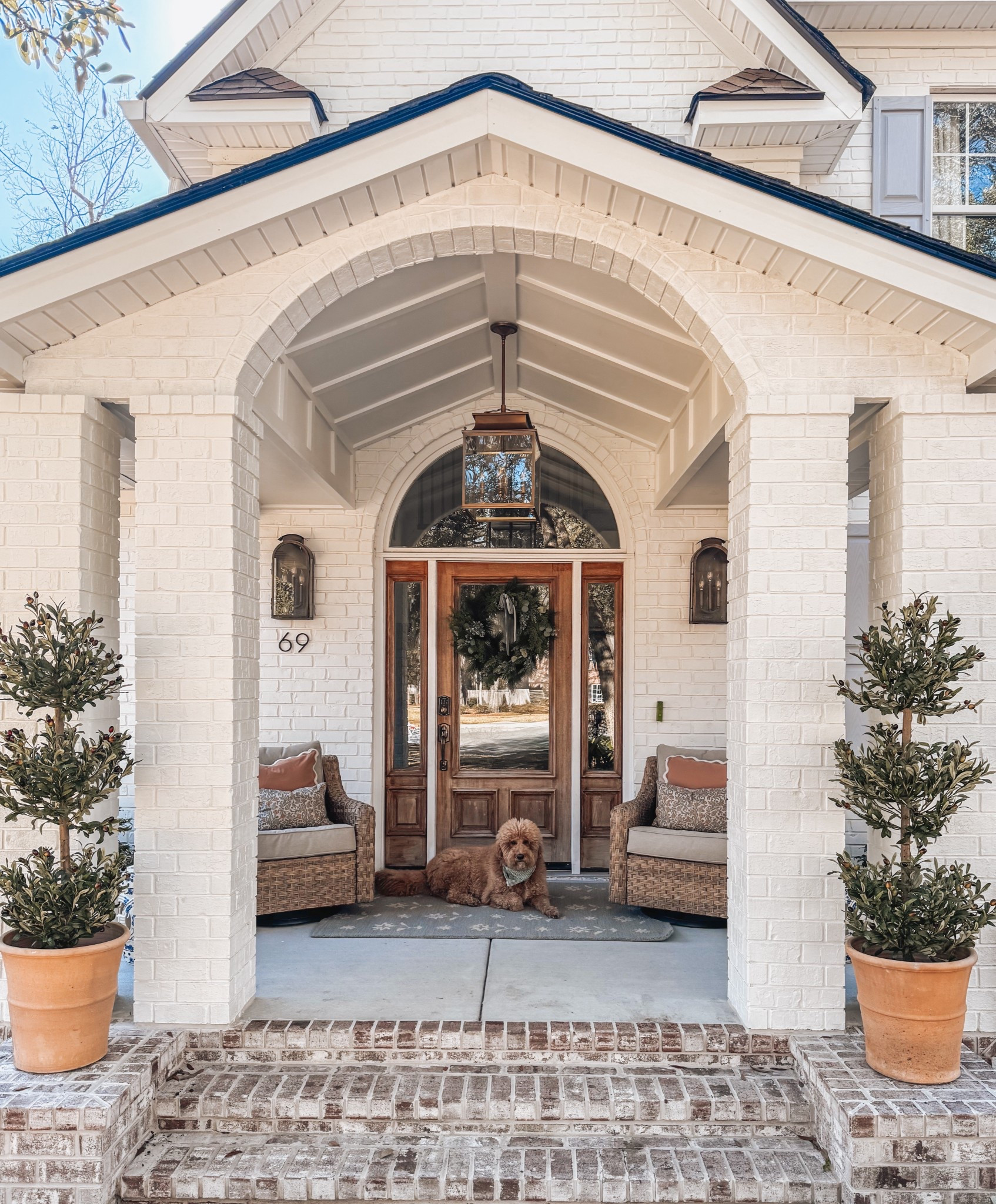 Sneak peek but kinda full peek because that’s how I do. I promise I’ll get Ale to take the pretty pictures but for now this is what you’re getting. I have a porch, yall! I can’t tell you how excited I am to say that! Ever since the day we bought this house we knew we would eventually do this. And now it’s here and I couldn’t be happier! Thank you to everyone that helped make this happen. I’m so so grateful and think about you every single time I get a package and don’t have to worry about it getting wet 🙌😆

Now this next decision is - do I paint the door blue to match my shutters? Or sand down and re stain it again? We’ve done that once but it would get beat by the sun every single day. So now that it’s covered, maybe it’ll last longer? I’m team blue, of course. My husband picks stain, of course. What do y’all think? 

#LTKHome