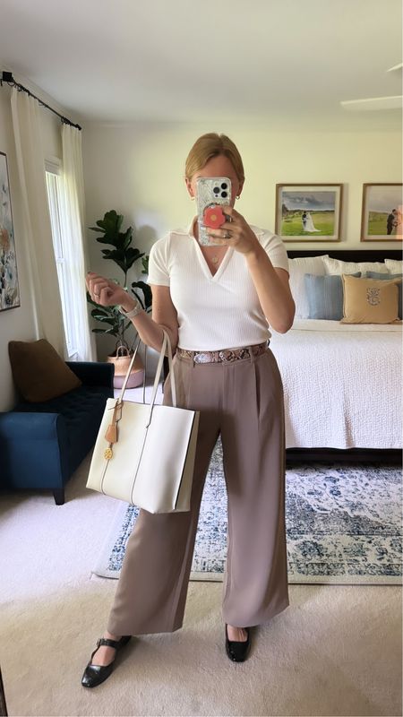 Neutral and casual work outfit idea for spring and summer

These crepe work pants feel like pajamas and have the best fit. I went with my true - according to the size chart- size and the regular length.

White polo tee is ribbed and very comfortable! Wearing my true size.

White work tote

Black Mary Jane’s 


#LTKSeasonal