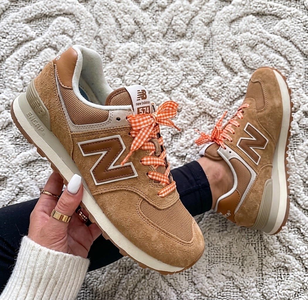 These New Balance 574s are the kind of sneakers that make every outfit look effortlessly put together 🤎. They run true to size, are incredibly comfortable, and the neutral color goes with everything from leggings to denim. I changed the laces for under $10!