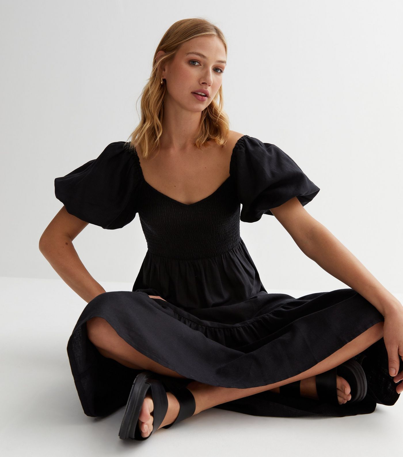 Black Shirred Sweetheart Puff Sleeve Midi Dress
						
						Add to Saved Items
						Remove from... | New Look (UK)