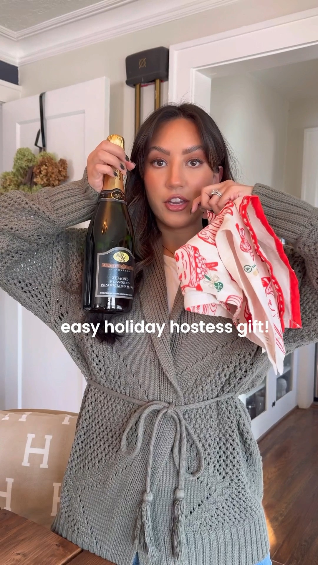 Easy gift idea to bring to the hostess of a holiday party! Make it personalized with something that they love on a tea towel, also added in one of my favorite wine bottle stoppers to make their leftover wine fresh!

#LTKGiftGuide #LTKFindsUnder50 #LTKHoliday