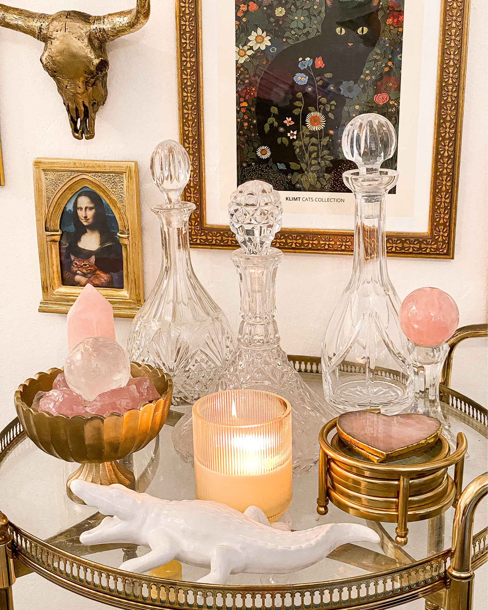 Chilly days means time to light some candles and get cozy 🥰 I’ve rearranged my bar cart area a few times over the past few months and I think I’ve settled on it being a cute display area for crystals…for now. I mean it’s not getting its full use as a bar cart, so it might as well be a crystal cart! 💖✨ 

I’ve linked all my decor as best as I could, many items here are thrifted! 

#LTKHome