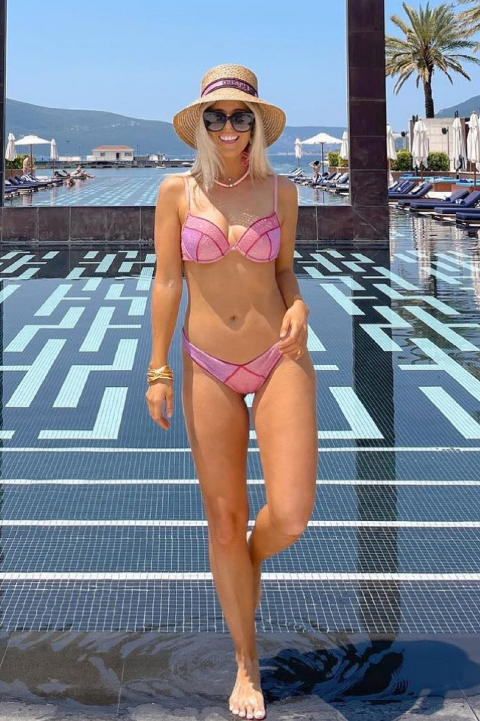 Shop below deck , star Bugsy , pink, shiny bikini top, and large brim, straw hat

#LTKswim #LTKstyletip #LTKtravel