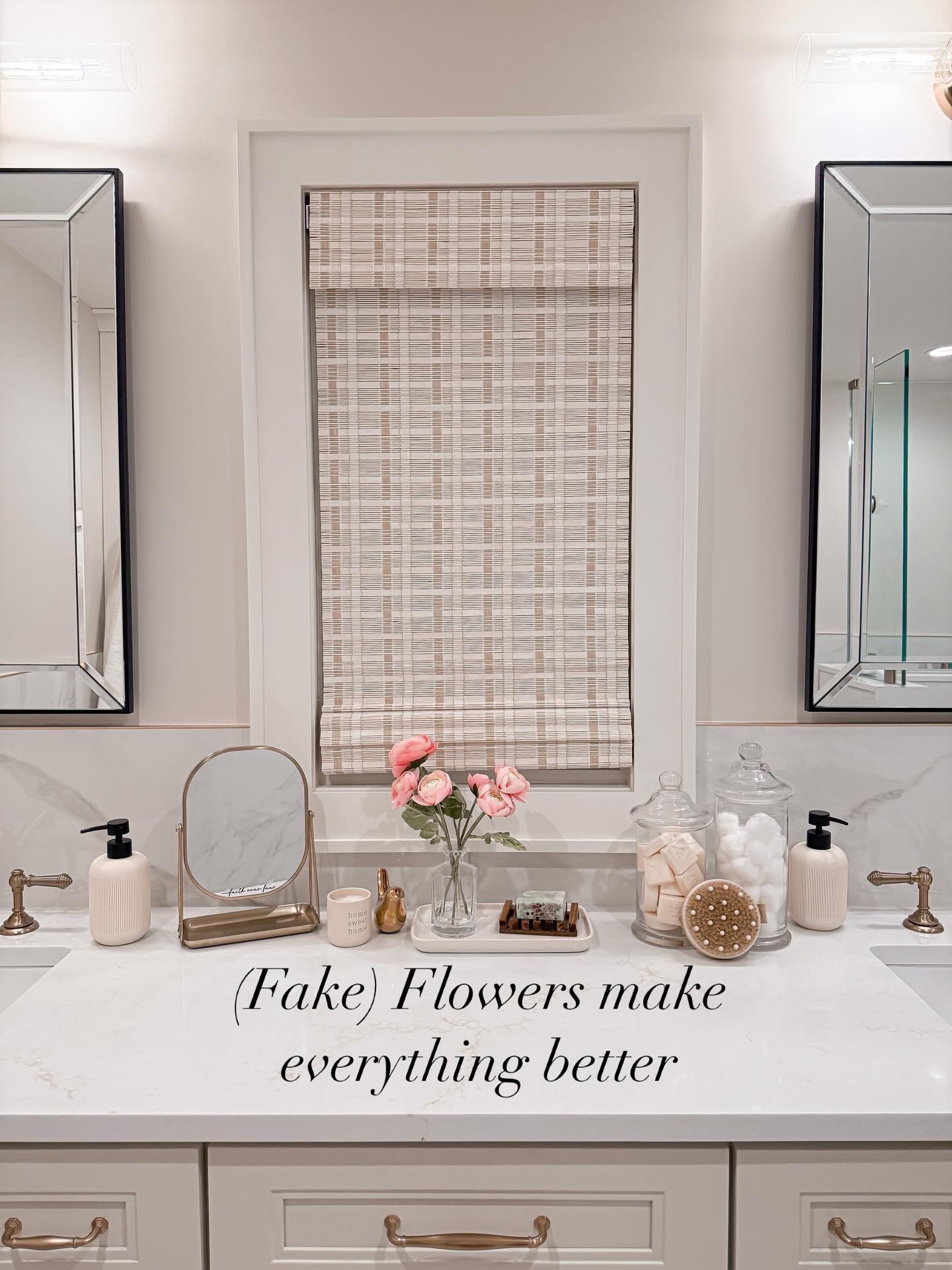 Obsessed with these flowers lately. They add the prettiest little pop of color to this space and somehow make the whole bathroom feel softer and happier.

Also just added this no-drill bamboo shade and I love the warmth and texture it brings in. It took two minutes to install and made such a difference.

#LTKSpringSale #LTKHome