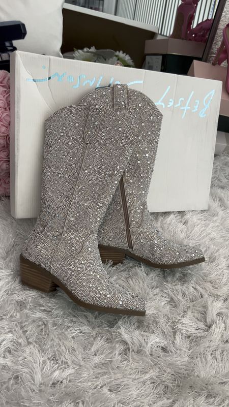 Rhinestone cowboy boots are definitely my kind of horsepower 🤍 just got in the mail and had to take them out for a ride! Obsessed with all the rhinestones, @betseyjohnson always does amazing work. Everything I’m wearing is linked for you girls to shop ✨ Xoxo, Lauren 

rhinestone cowboy boots, rhinestone boots, rhinestone western boots, booties, white skirt, linen button down shirt, rhinestone purse, rhinestone bag, western style, cowboy style, western chic outfit, dyson airwrap hairstyle, amazon fashion finds, amazon style, amazon fashions, betsey Johnson shoes, h&m finds 

Follow my shop @lovelyfancymeblog on the @shop.LTK app to shop this post and get my exclusive app-only content!

#liketkit #LTKParties #LTKItBag #LTKFestival #LTKVideo #LTKShoeCrush
@shop.ltk