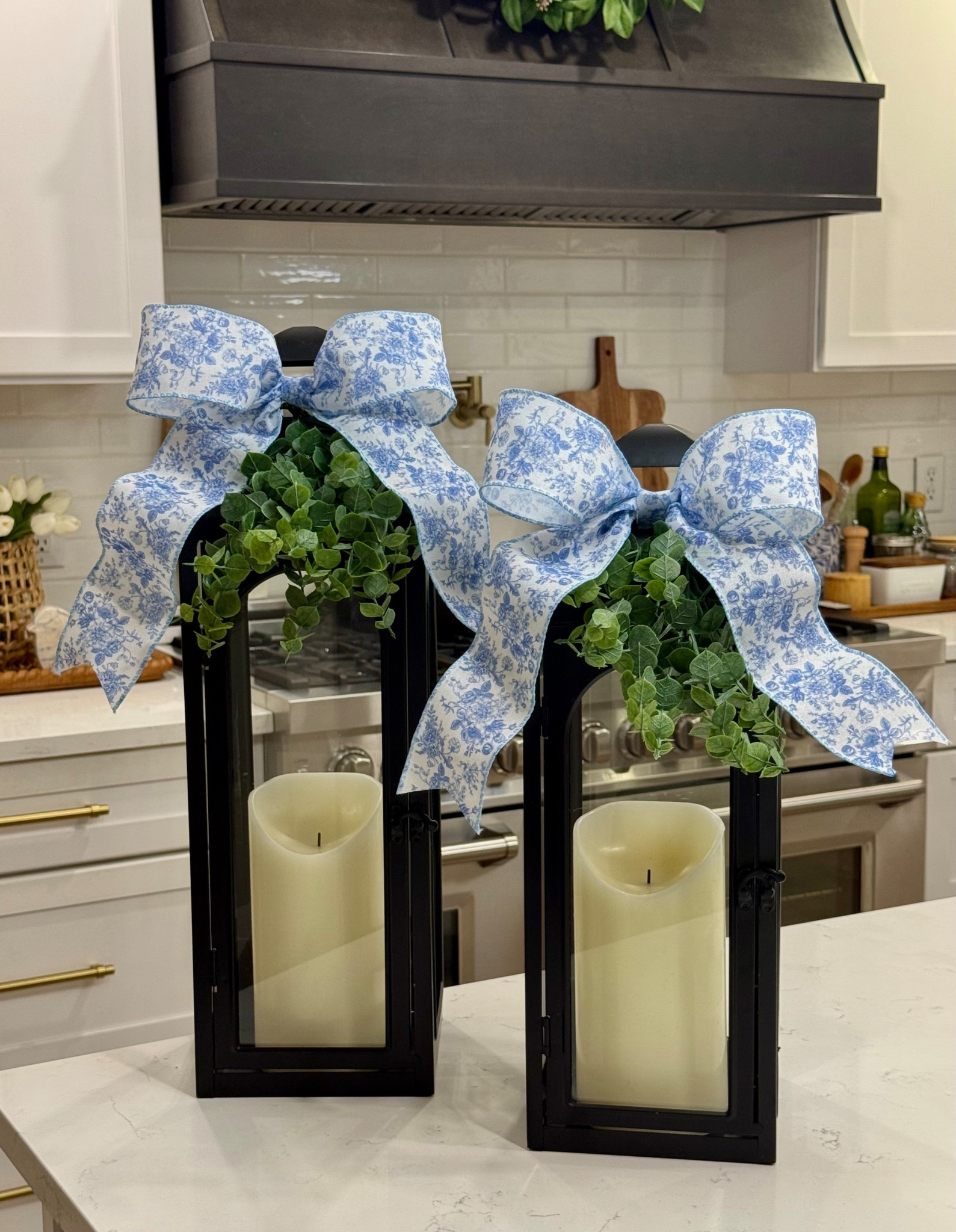Here’s how I used the blue chinoiserie ribbon.  I’m putting these lanterns on my front porch. You may remember me sharing my spring refresh out there. It’s going to look so good with the hydrangeas!💙🤍
The ribbon comes in blue, pink and green 

#LTKHome #LTKSeasonal