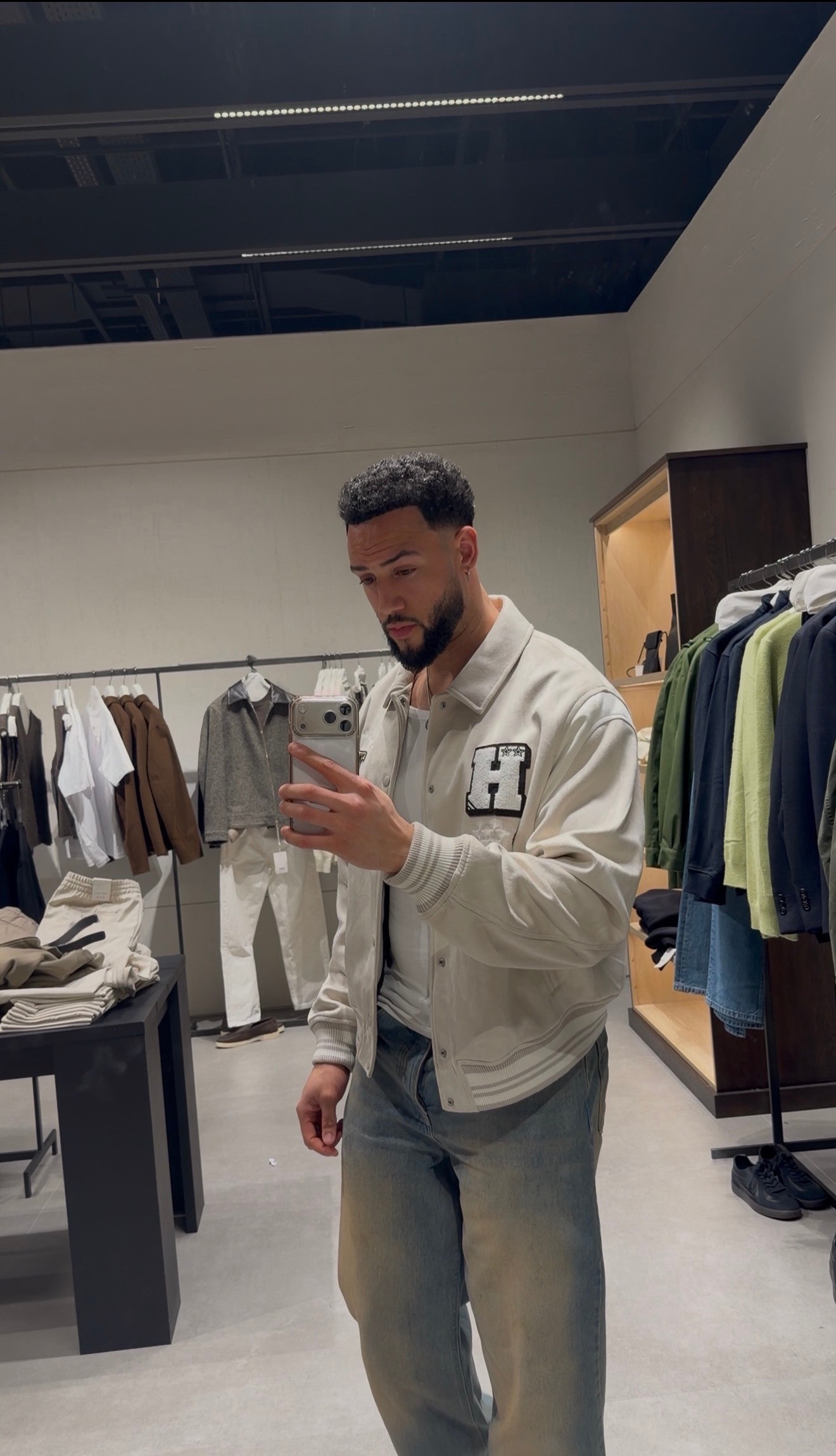 Cream varsity jacket + relaxed denim 🤍 An easy men's autumn outfit for coffee runs and weekend plans. Recreate the look with the similar boohooMAN ecru collared varsity jacket linked below — this alternative has contrasting brown sleeves. Similar jeans and white vest also tagged. Save this fit for later.

#MensFashion #AutumnOutfits #CasualStyle 

 #LTKuk #LTKautumn #LTKmens