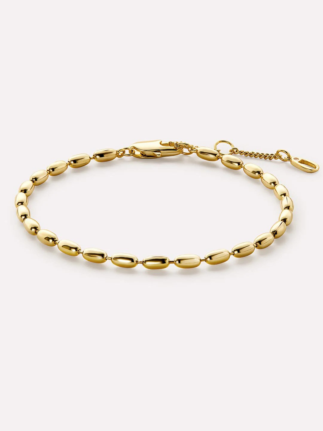Perfectly minimal and chic, this gold chain bracelet plated in 14k gold features a polished finis... | Ana Luisa