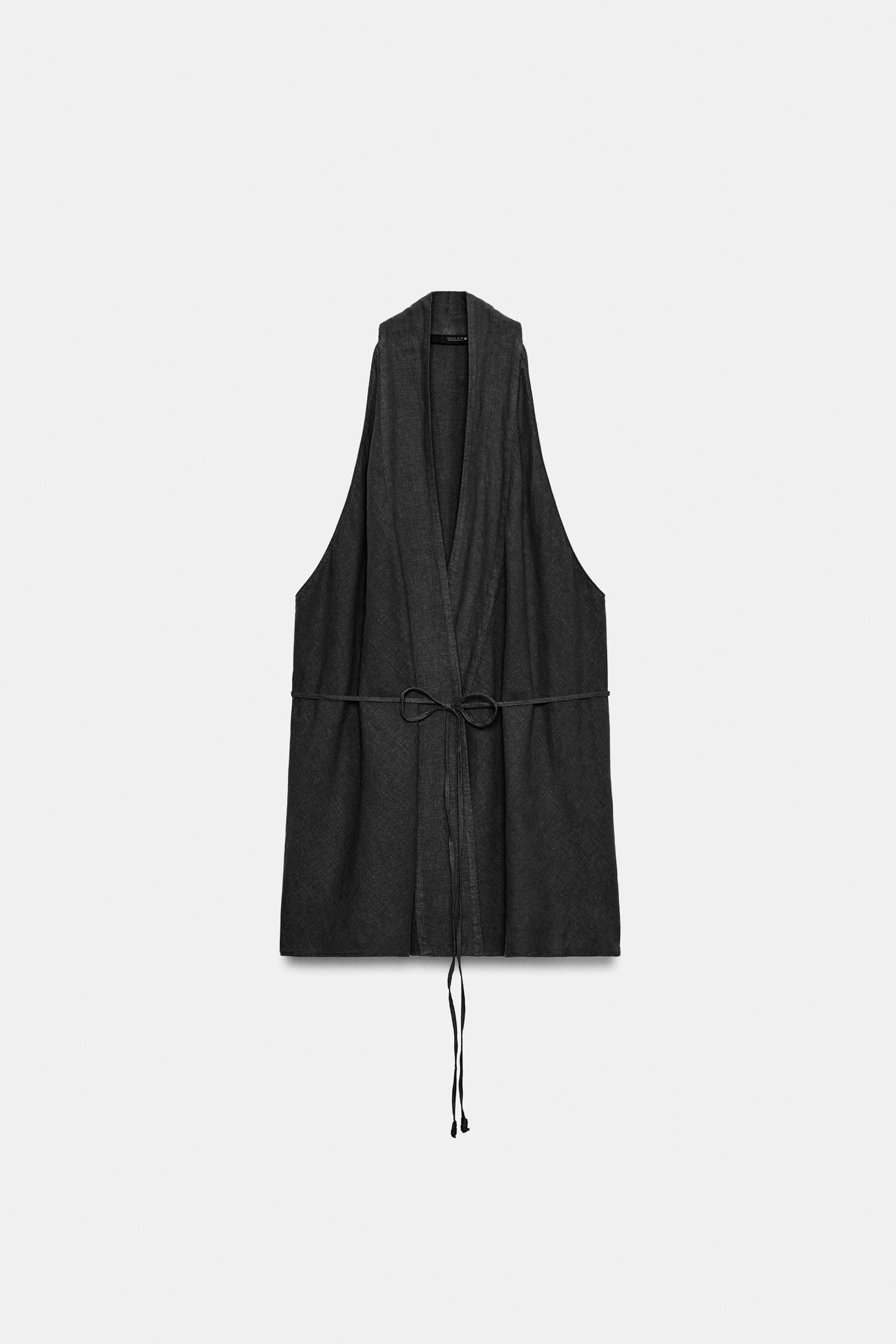 ZARA WOMAN COLLECTIONTop made of linen yarn. V-neck and sleeveless. Straight hem. Front wrap clos... | Zara US