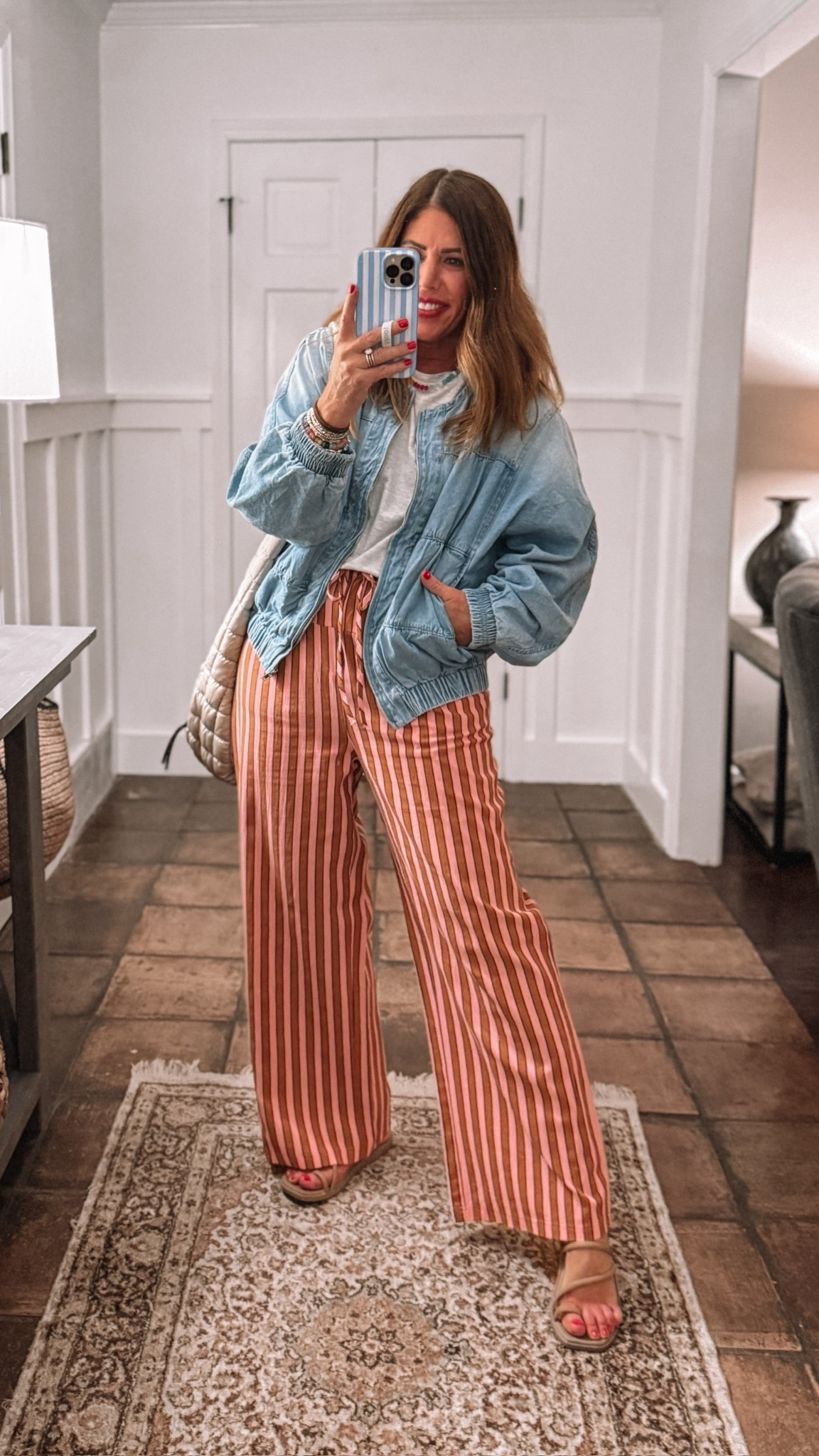 Amazon look for less outfit you can wear now & later😍

My favorite look for less striped pants that are identical to the free people Hudson Canyon stripe. They are 100% cotton and they come in several colors. I have three different colors and this rust/pink combo is one of my favorites. They are so comfy you can style them so many different ways. I’m wearing my true size medium.

This cropped tee is one of my favorites. It is a look for less that is just like the free people inspire tees. It is 95% cotton/5% spandex. I’m wearing my true size medium. 

Look for less denim jacket is just like the free people Layla jacket. it’s under $47 vs. $148 
Great quality & mostly cotton blend. I’m wearing a large for a true oversized fit!


#LTKMidsize #LTKOver40 #LTKWorkwear