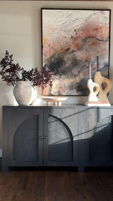 A closer look at this stunning cabinet from Lulu & Georgia I love, and so many of you do too! I styled it with some organic pieces, such as this textured vase, this travertine bowl, and these stunning candle holders from CB2! 

#LTKstyletip #LTKhome