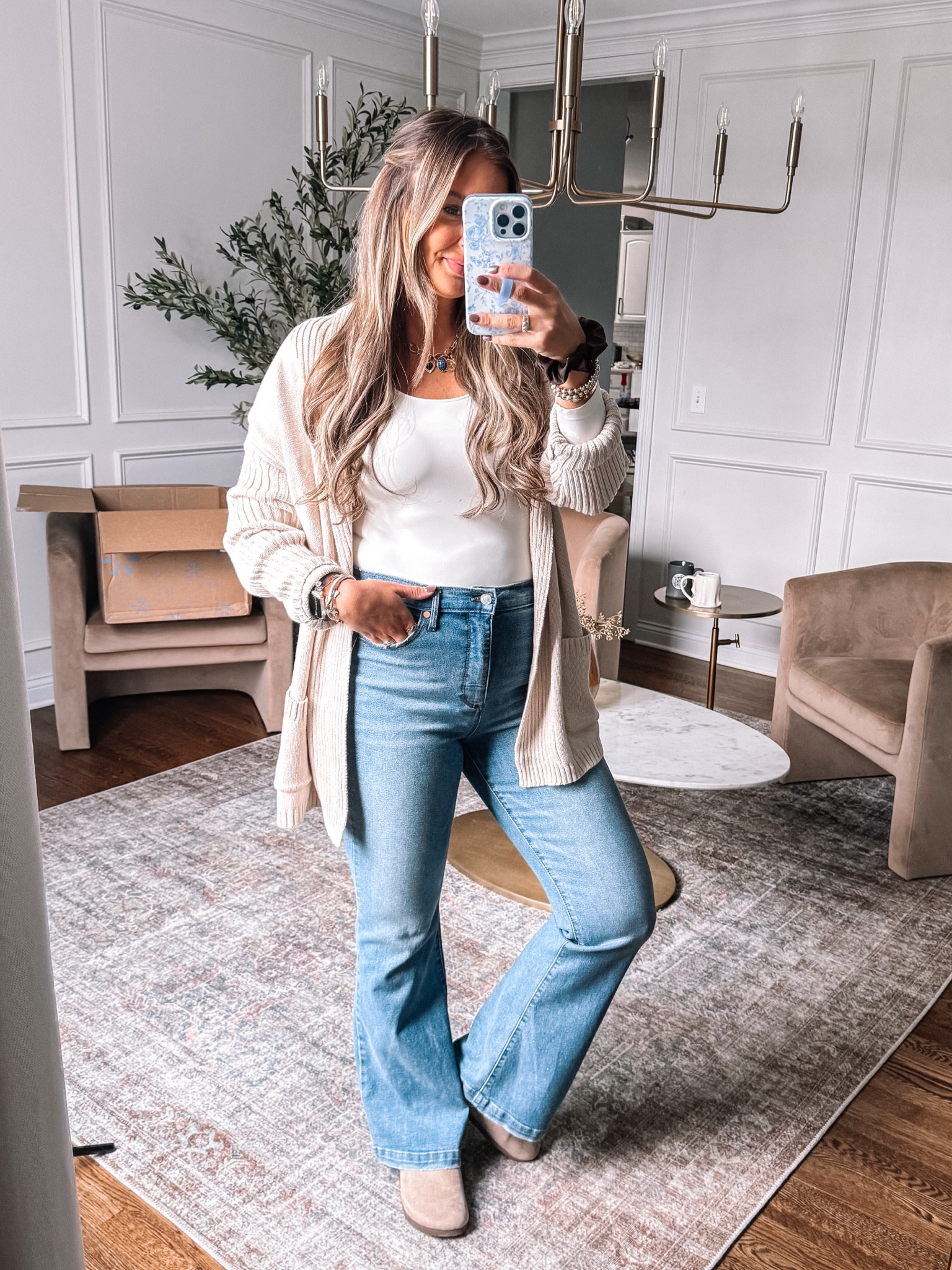 Fall Walmart outfit idea a chunky knit cardigan, the smoothest layering bodysuit and flare jeans. 



#LTKStyleTip #LTKSeasonal #LTKFindsUnder50