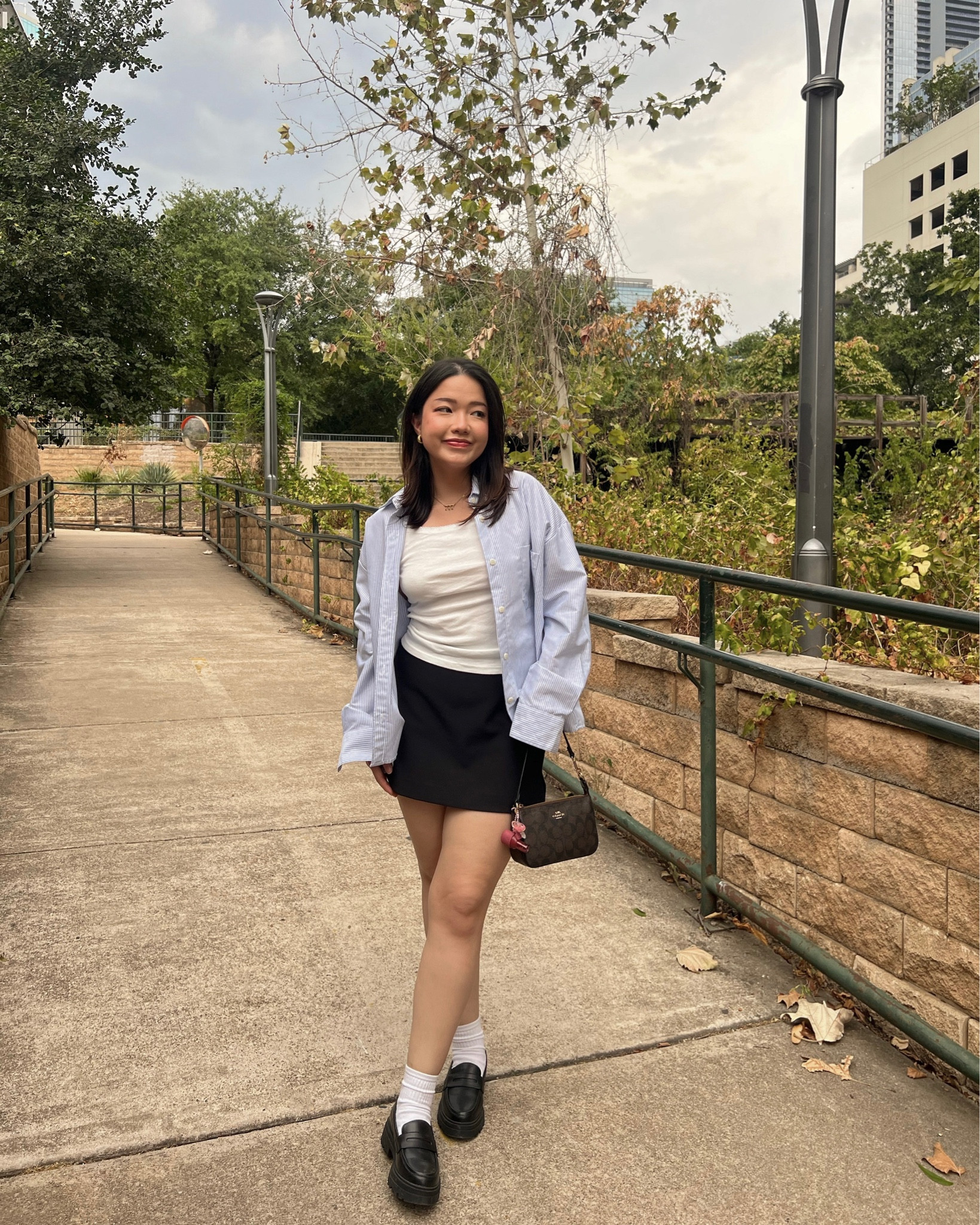 fall transition outfit inspo

tank is from brandy melville and shirt is from djerf avenue but linking similar options below

mini skirt outfit, oversized button up, blue striped button up, black mini skirt, loafer outfit idea

#LTKstyletip