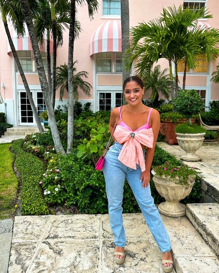 Brunette Barbie 🎀✨ This pretty pink outfit perfectly matched The Colony Hotel’s aesthetic. I live in these #Abercrombie boyfriend jeans, and I’m obsessed with my bow #loveshackfancy top.

#LTKstyletip #LTKtravel #LTKcurves