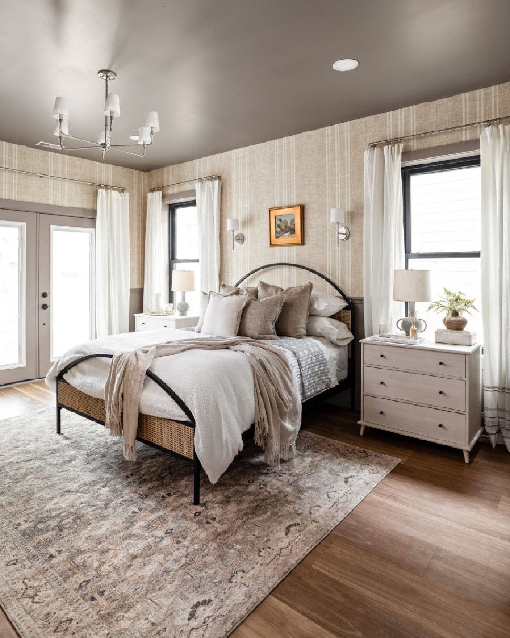 Wallpaper and a chair rail have the bedroom a luxurious feel.

#LTKhome