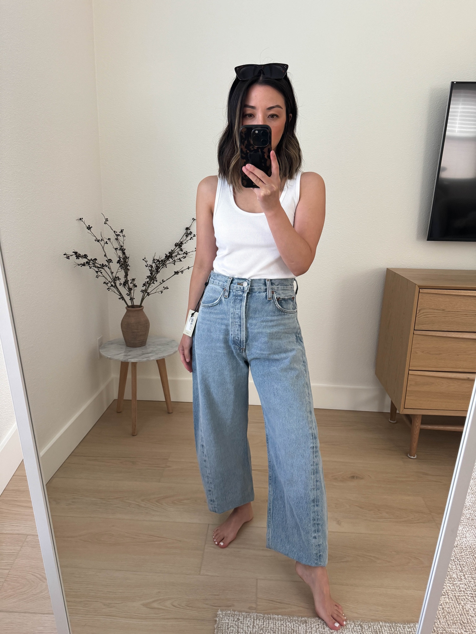 Agolde Luna pieces jeans. Curve jeans. These are incredible. So soft, perfect soft blue and they don’t curve out too much. I sized up. 

Z Supply tank xs
Agolde jeans 25. Need to cut the hems  