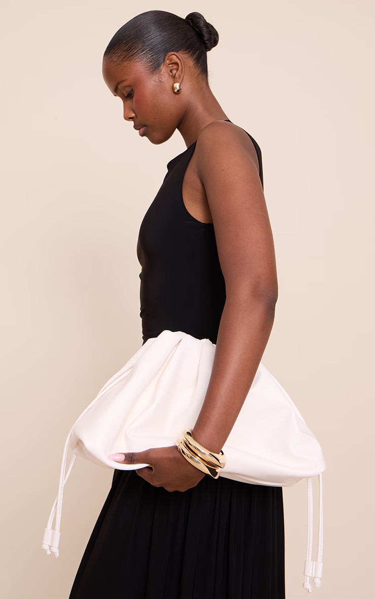 Cream Pu Oversize Drawstring Clutch Bag | PrettyLittleThing US