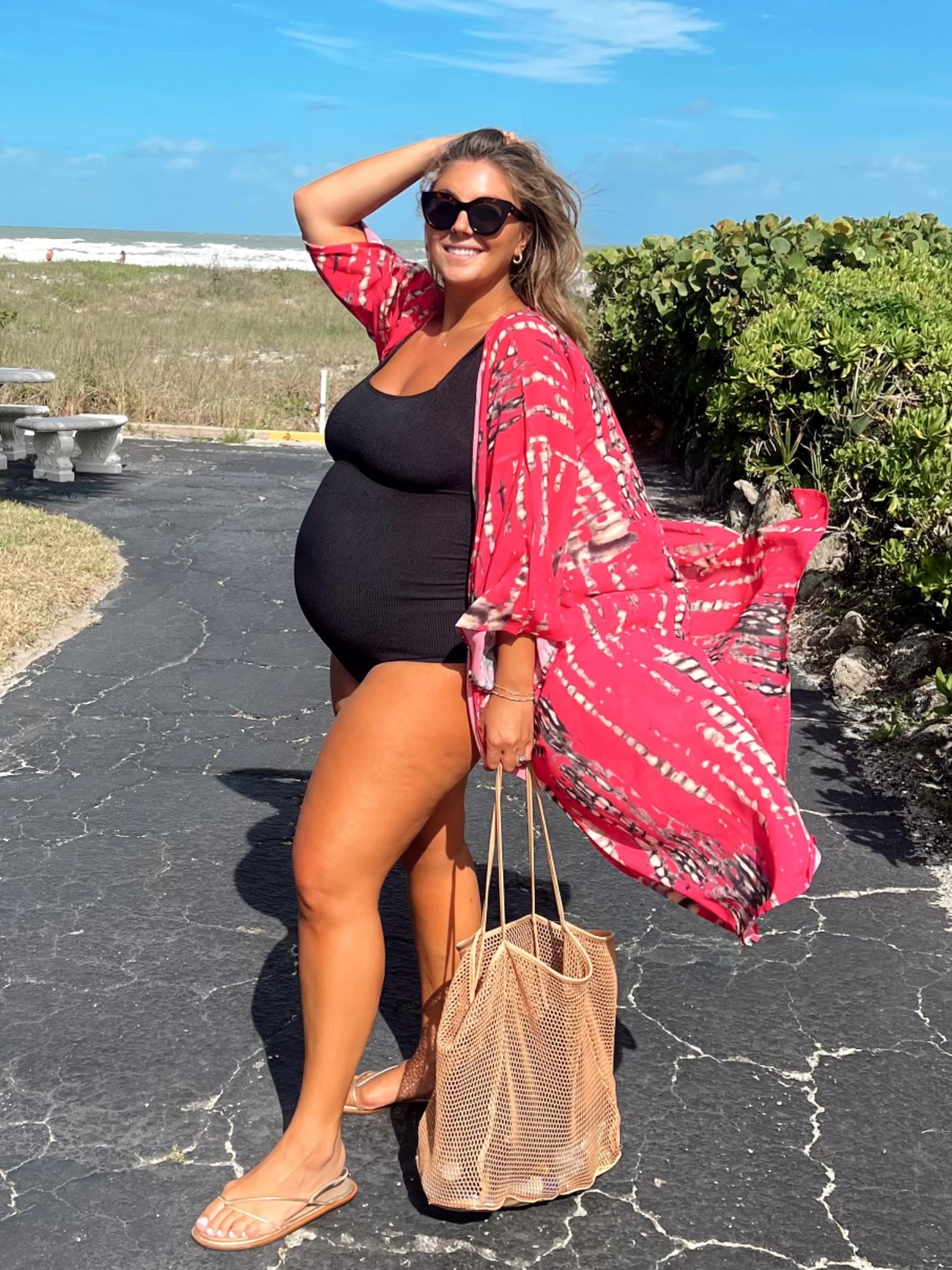 Wearing size XL in maternity swimsuit, use CARALYNM at Cakes Body. 

#LTKSwim #LTKBump #LTKMidsize