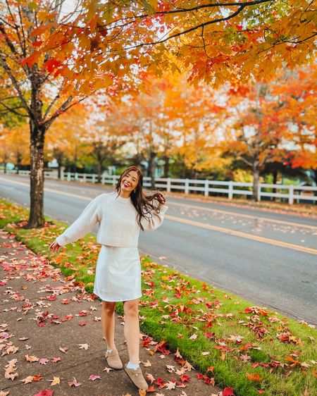 Paired a cropped sweater over this white silk dress and it makes such a cute outfit for transitioning from summer to fall. I’m a 6.5 in shoes and sized down to a 6 in these suede clogs
#falloutfits #fallootd #falloutfitinspo