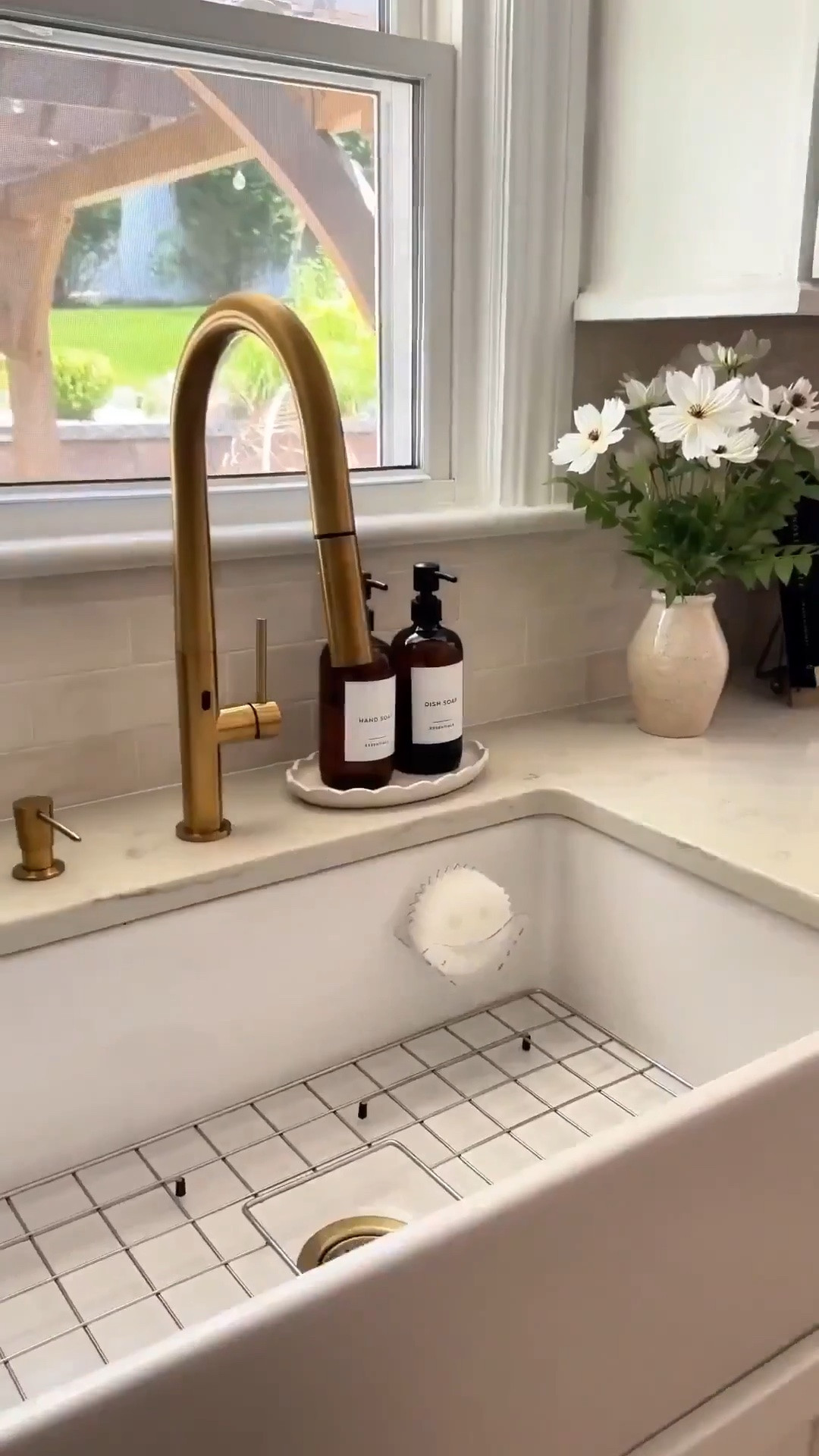 The little kitchen corners really can make the biggest difference. 🤎✨

A simple tray, a pretty soap dispenser, and a few everyday essentials instantly made this sink area feel more pulled together.

Nothing major or expensive—just a few small details that made the space feel cleaner, calmer, and a little more inviting. 🌿

I’m always surprised by how much of a difference these little styling updates can make.

#LTKHome #LTKmomlife #LTKdayinmylife