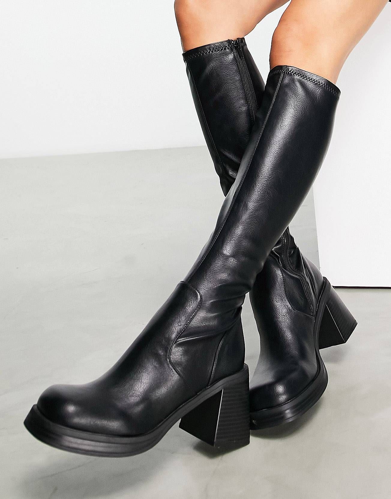 ASOS DESIGN Catch mid heel sock knee boots in black | ASOS (Global)