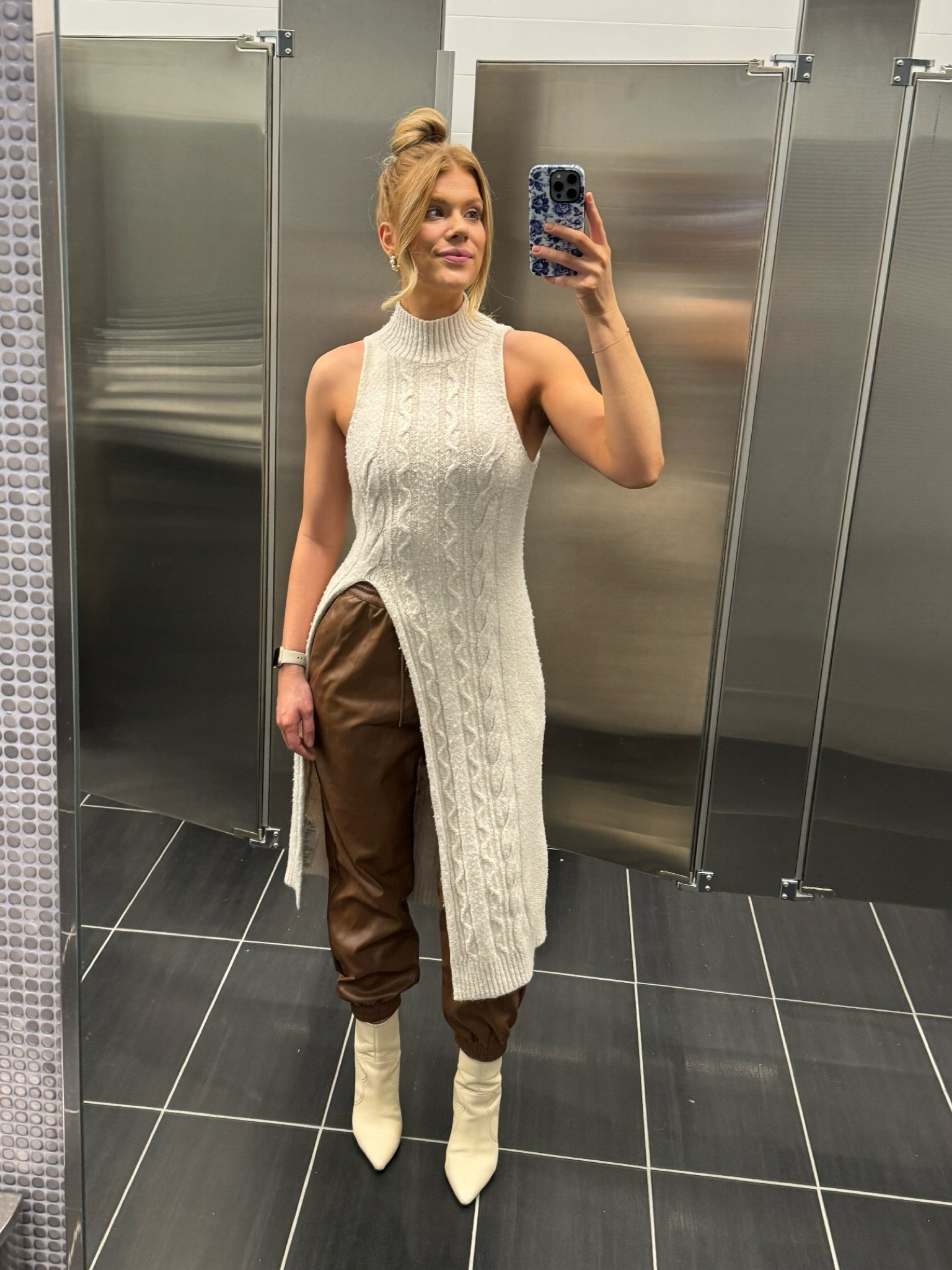 Perfect winter to spring transition outfit! Long sweater tank with brown leather joggers

#LTKfindsunder100 #LTKstyletip #LTKworkwear