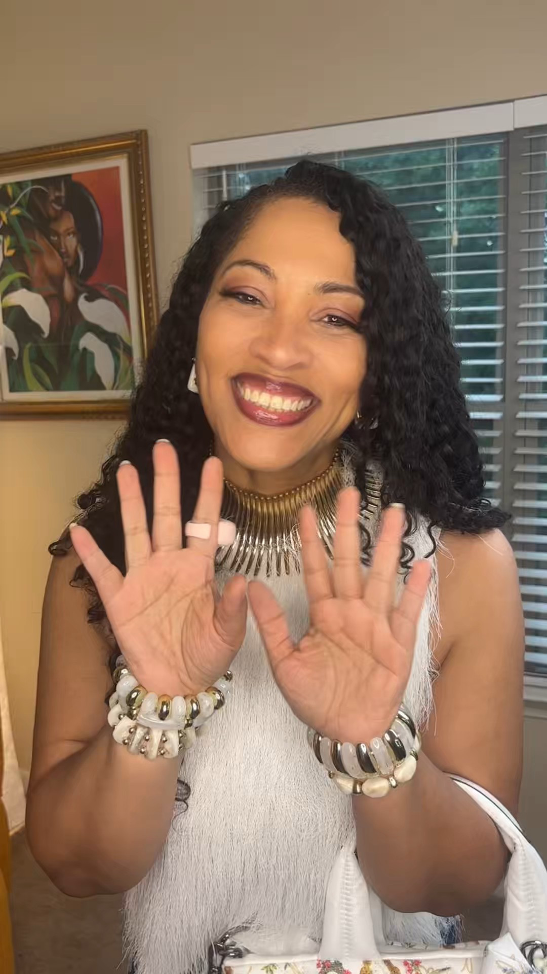 GRWM to go to dinner! I had to keep it hot! So I wore this white short sleeve fur top, gold African choker, white u-shaped acrylic earrings, white & gold chunky bangle bracelets, gold oval sandals, long pocket shorts & a white nylon Lagerfeld bag. .https://bit.ly/4dWNX1hLarge White Karl Lagerfeld

#LTKgrwm #LTKootd #LTKOver40