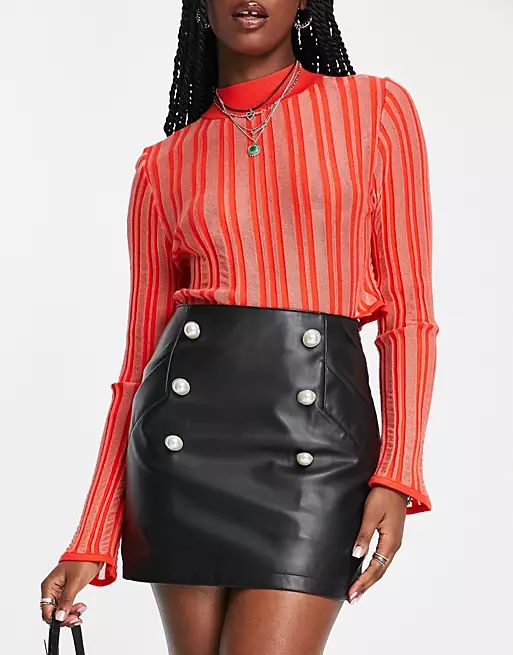 ASOS DESIGN faux leather mini skirt with pearl button detail in black | ASOS (Global)