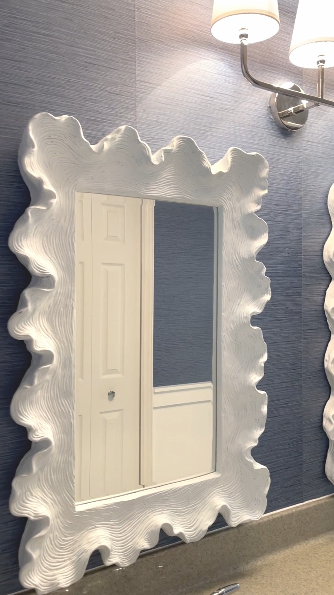 My bathroom makeover with blue grass cloth peel-and-stick wallpaper and white coral mirrors is one of my favorite modern coastal moments. I love how the textured blue walls paired with crisp white accents make the space feel elevated, layered, and designer-inspired. 

#LTKU #LTKHome #LTKSaleAlert