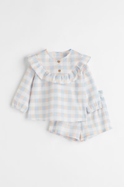 Set with a blouse and pair of shorts in a cotton weave. Blouse with a round neckline, two buttons... | H&M (US + CA)