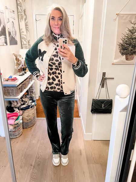 Outfits of the week

Bundling up in the home office with a teddy fleece baseball jacket, a leopard print lightweight turtleneck top and long forest green velvet trousers. Paired with high top sneakers to keep it comfortable. 

Jacket L
Top M (a large would probably be better)
Trousers EU40 
Sneakers tts

#LTKeurope #LTKSeasonal #LTKHoliday